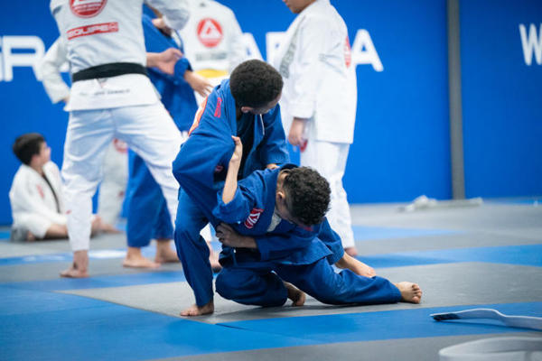 Structured youth BJJ classes (Ages 6–17) at Gracie Barra Westchase | Phone: +1 (713) 977-7418 Structured youth BJJ classes (Ages 6–17) at Gracie Barra Westchase | Phone: +1 (713) 977-7418
