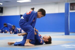 Black belt track for teens: Self-defense mastery at Gracie Barra Westchase | Phone: +1 (713) 977-7418
