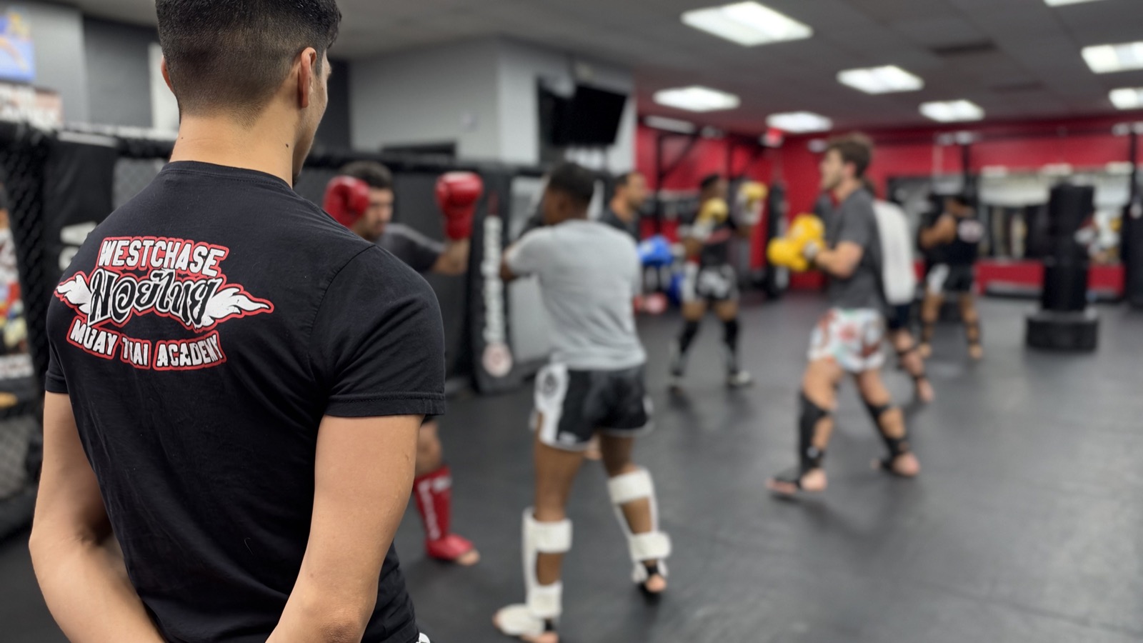 Students training together in a Muay Thai class at Gracie Barra Westchase in Houston